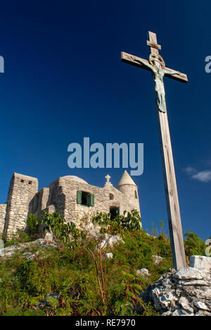 The Ermite small monastery at the top of Mount Alvernia on Cat island, over 63 meters, Bahamas. Mt. Alvernia Hermitage and Father Jerome's tomb atop C Stock Photo