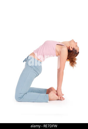 Beautiful Yoga: The Camel Pose - Real senior woman doing Ushtrasana exercise Stock Photo