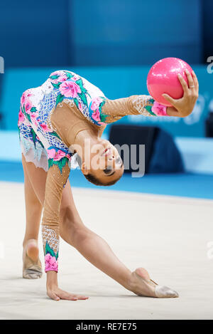 Kiev, Ukraine - August 28, 2013:  Unidentified female athlete performs with ball during 32nd Rhythmic Gymnastics World Championships. The event is hel Stock Photo