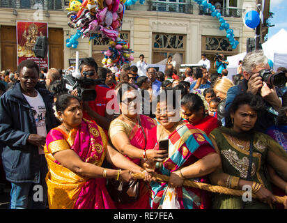 The devotees celebrating the Ganesha hindu festival- Ganesh Chaturthi in the streets of Paris. Stock Photo