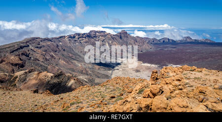 View from the summit of Guajara over the mountains of the caldera rim on Mount Teide in the Canary Islands Stock Photo