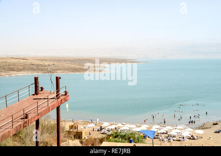 Jetty with fisherman sculpture at the Dead Sea (West Bank), hypersaline and lowest lake in the world, at -430m below sea level Stock Photo