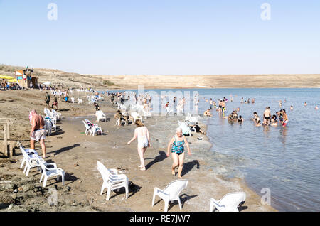 Seniors bathing in the Dead Sea (West Bank), hypersaline and lowest lake in the world, at -430m below sea level Stock Photo
