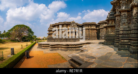 Halebidu, India- December 20, 2018 : Tourist at hoysaleswara temple, is a 12th-century Hindu temple dedicated to Shiva includes many themes from Vaish Stock Photo