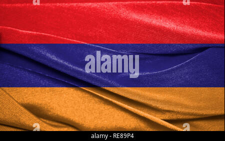 Realistic flag of Armenia on the wavy surface of fabric. Perfect for background or texture purposes. Stock Photo