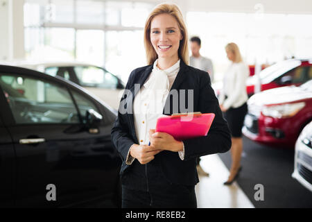Picture of attractive saleswoman working in company Stock Photo