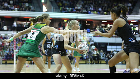 South Africa SPAR Proteas Erin Burger (left) and New Zealand Silver Ferns Laura Langman (centre) battle for the ball during the Vitality Netball International Series match at The Copper Box, London. Stock Photo