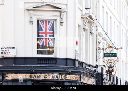 London, UK - June 21, 2018: Closeup of famous Bag O'Nails of Nails pub bar sign on Buckingham Palace Road with Greene King entrance and nobody Stock Photo