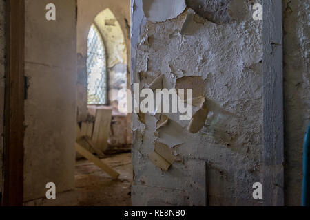 Old paint and plaster peeling of interior of abandoned church walls , gairlochy spean bridge lochaber highlands Scotland uk Stock Photo