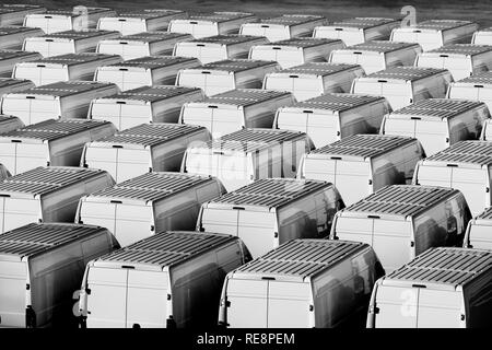 New factory vans parked in an orderly manner Stock Photo