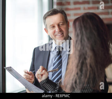 closeup.business partners signing a new contract. business concept Stock Photo