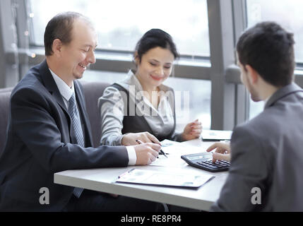 businessman and business team analyzing financial data Stock Photo