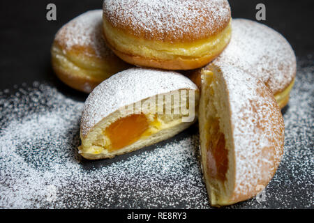 Berliner Doughnuts European donuts tradicional bakery for fasching carneval time with peach jam in Europe Stock Photo