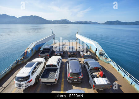 Trad, Thailand - December 02, 2018: A lot of cars on ferry boat to the popular travel destination Koh Chang, Trad province, Thailand. Stock Photo