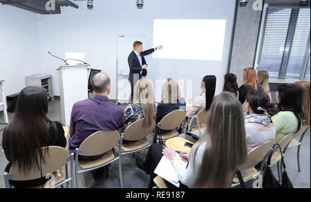 businessman discussing a new business project with the members of his team Stock Photo