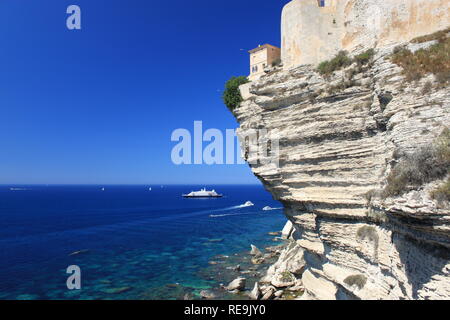 Impressive house on cliff edges in Bonifacio town, Corsica, France Stock Photo