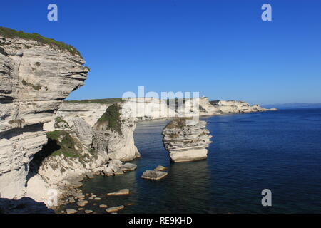 Impressive cliffs and Grain de Sable rock at Bonifacio Strait Nature Reserve, Corsica, France Stock Photo