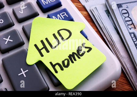 HUD homes written on a piece of paper. Stock Photo