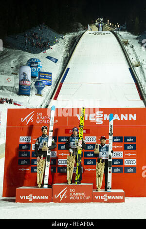 Zakopane, Poland. 20th Jan, 2019. L-R) Robert Johansson (2nd place) of Norway, winner Stefan Kraft of Austria and Yukiya Sato (3rd place) of Japan seen posing for photographers after the individual competition at the FIS World Cup Ski Jumping day three in Zakopane, Poland. Credit: Diogo Baptista/SOPA Images/ZUMA Wire/Alamy Live News Stock Photo