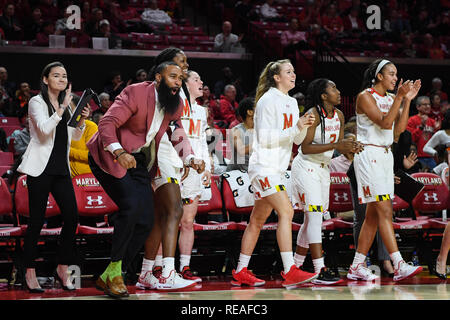Penn State players react during an NCAA college volleyball game against