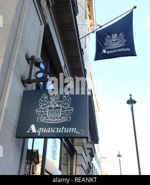 Aquascutum brand logo seen in Carnaby Street in London UK Stock