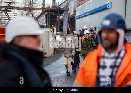 Bremerhaven, Germany. 21st Jan, 2019. Federal Defence Minister Ursula von der Leyen (CDU) takes off her safety helmet after her visit to the sailing training ship of the German Navy 'Gorch Fock'. Credit: Mohssen Assanimoghaddam/dpa/Alamy Live News Stock Photo