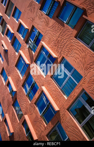 Building Facade - A leaf wave design decorates the exterior of a building. London, England, United Kingdom Stock Photo
