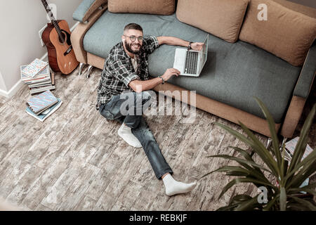 Top view of a cheerful nice young man Stock Photo