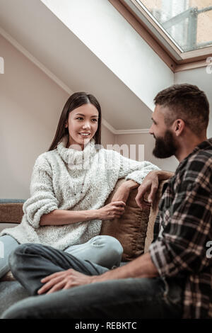 Positive nice young couple having a conversation Stock Photo