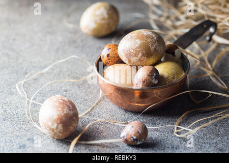 Easter background with painted Easter eggs in vintage style over dark background Stock Photo