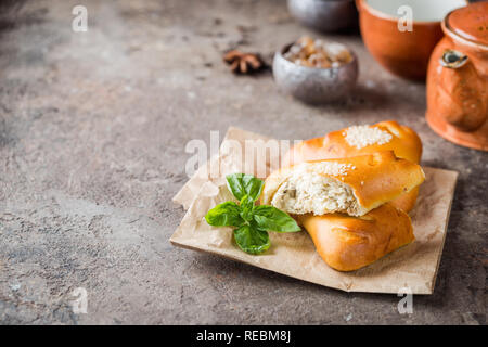 Homemade chicken and mushroom mini pies on paper Stock Photo