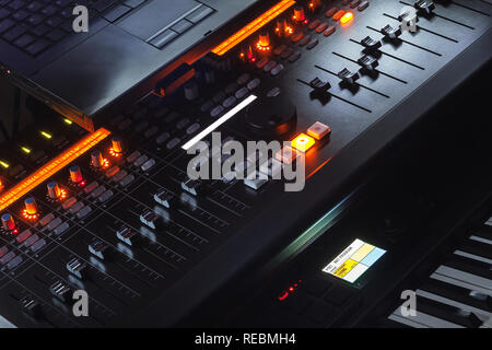 Modern music studio equipment, closeup view of mixing console. Stock Photo