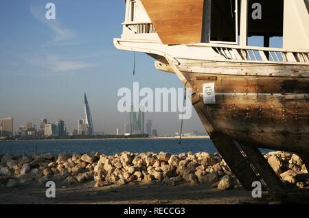 Skyline of the Corniche as seen from King Faisal Highway, Muharraq side, World Trade Center buildings, left, beside the towers Stock Photo