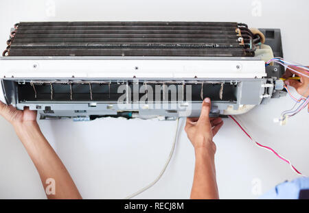 Disassemble and Clean Air Conditioner  Parts by high pressure water or air from nozzle or vacuum. Device Maintenance, Health Care, Germ Proactive Prev Stock Photo