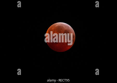 Super Blood Wolf Moon over Allerwash, Northumberland, UK Stock Photo