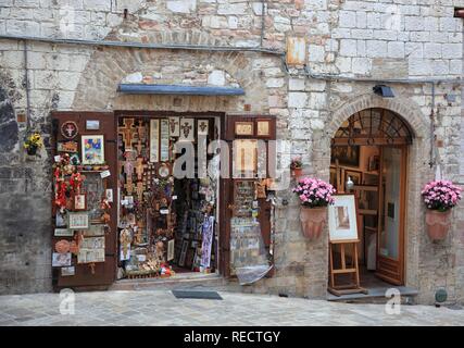 Shop for devotional objects in the historic town of Assisi, Umbria, Italy, Europe Stock Photo