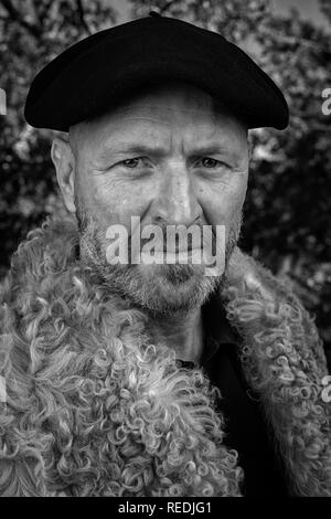 Portrait of a shepherd being in his traditional workwear and wearing a Basque beret (South-west France). Portrait d'un berger en tenue traditionnelle. Stock Photo