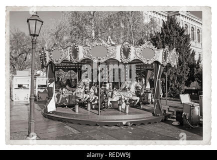 Old fashioned french carousel with horses Vintage Monochrome photo Stock Photo