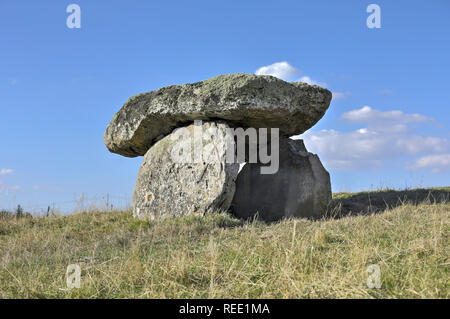 French dolmen situated in Cantal, Auvergne, France near Saint flour city. It is composed with two vertical megaliths supporting a large flat horizonta Stock Photo