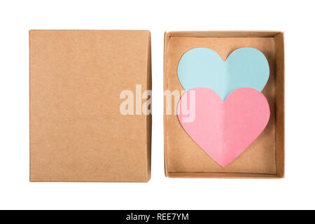 Above view on two paper hearts in cardboard box isolated on white background Stock Photo