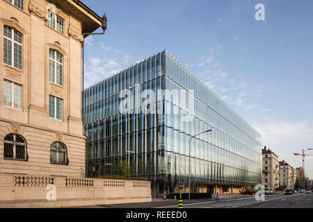 Facade juxtaposition with street. Swiss Re Office headquarters, Zurich, Switzerland. Architect: Diener & Diener, 2017. Stock Photo