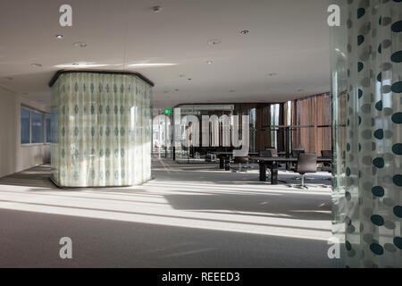 Open plan office with glazed think tanks. Swiss Re Office headquarters, Zurich, Switzerland. Architect: Diener & Diener, 2017. Stock Photo