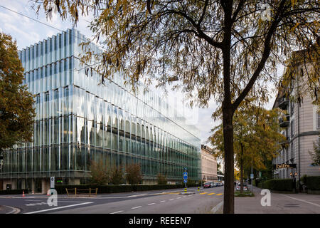 Corner elevation of undulating glass facade and street. Swiss Re Office headquarters, Zurich, Switzerland. Architect: Diener & Diener, 2017. Stock Photo