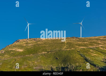 View of a wind turbines on top of mountains, in Portugal... Stock Photo