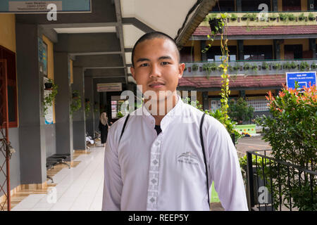 8.30, Dayak boy in uniform, IndonesianBook Stock Photo