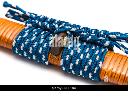 Blue sageo: cord for tie the rattan wrapped scabbard of Japanese sword and steel fitting isolated in white background. Stock Photo
