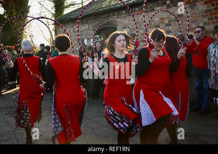 Grimsby folk dancing group The Herring Gals celebrate Wassail at the Skidbrooke Cyder Company, Lincolnshire, England. Stock Photo