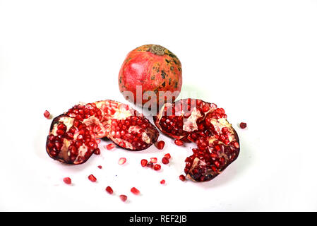 Juicy pomegranate on white background Stock Photo