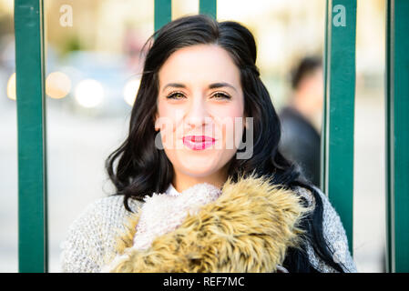 40 years old woman in retro style smiling at camera with beautiful eyes, concept of happiness at maturity. Stock Photo