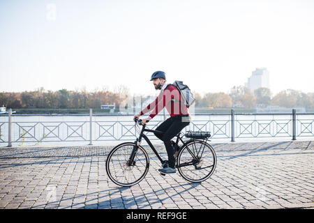 A New Modern Alternative Mode of Transport. Eco-friendly Electric Bike.  Hipster Businessman Commuter with Electric Stock Image - Image of office,  business: 272790199